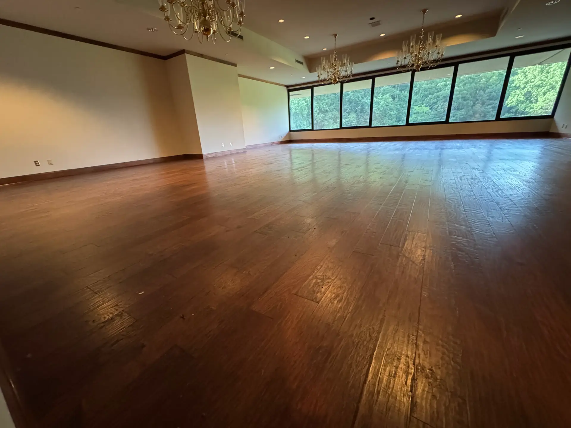 Wood-floor gathering room at Tributary Center